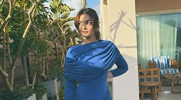 ملك أحمد زاهر تتألق بفستان أزرق في أحدث ظهور لها مع مجموعة من الصور